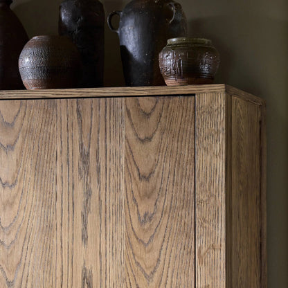 Bedford Cabinet by Four Hands in warm natural oak veneer, gunmetal. Made from thick oak veneer, solid oak, iron in a unique style.