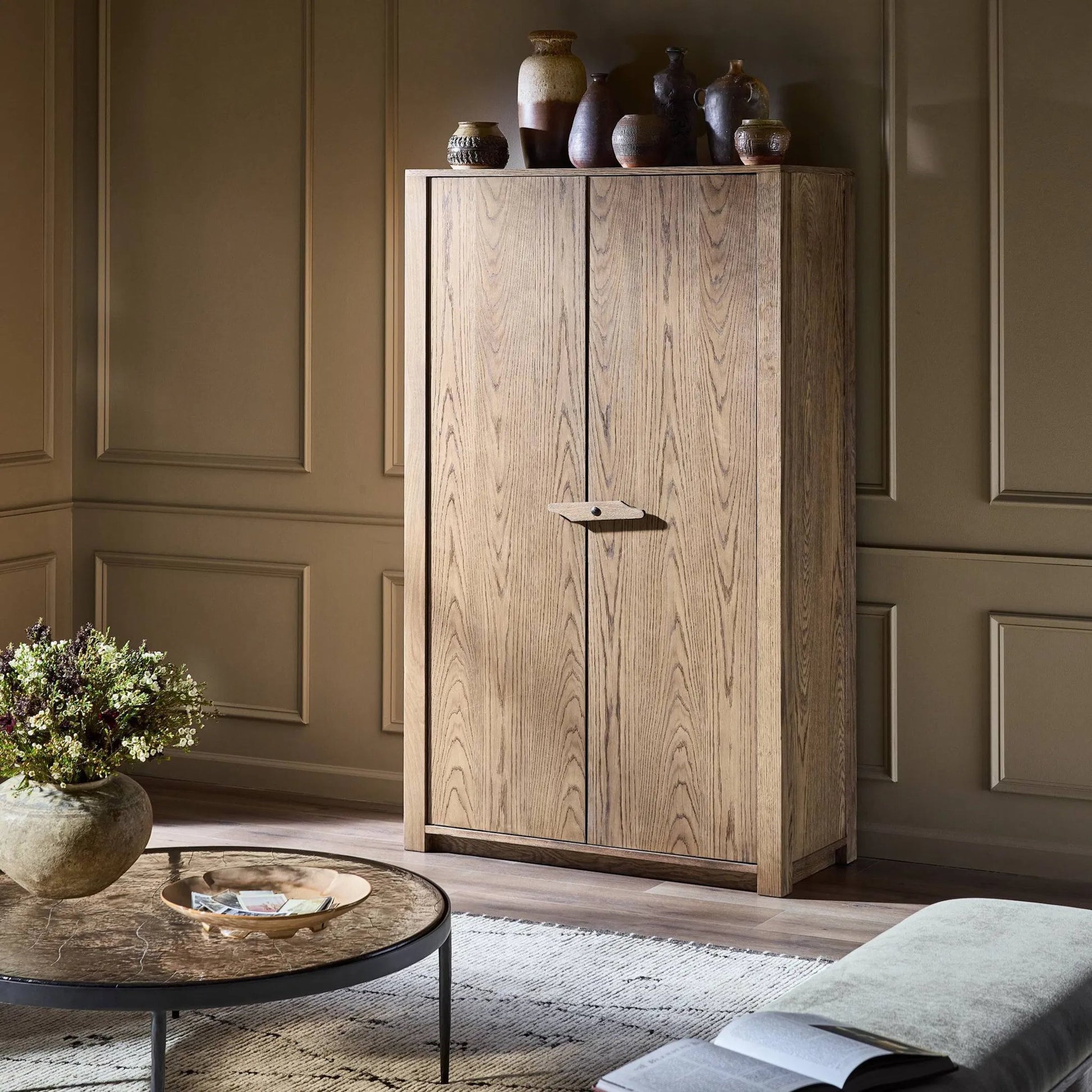 Bedford Cabinet by Four Hands in warm natural oak veneer, gunmetal. Made from thick oak veneer, solid oak, iron in a unique style.