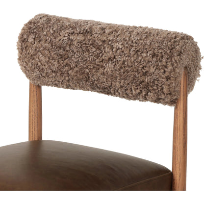 Jazelle Dining Chair by Four Hands in havana brown, tan oak, taupe shearling. Made from top grain leather, solid oak, shearling in a traditional style.