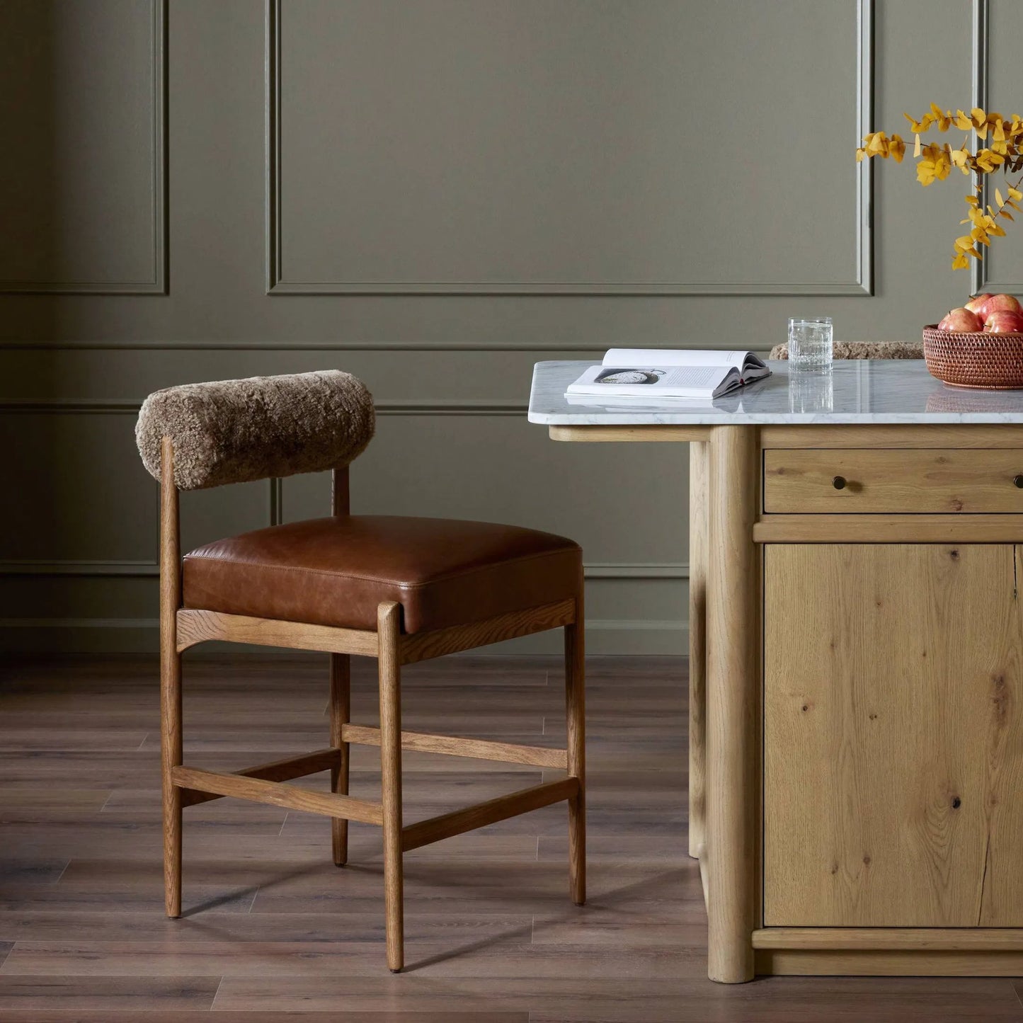 010 SI-2519208 | Lifestyle | Jazelle Counter Stool by Four Hands in havana brown, tan ash, taupe shearling. Made from top grain leather, solid ash, shearling in a traditional style.