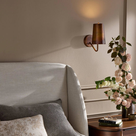 Vincennes Sconce by Four Hands in iridescent acid wash, black cord. Made from stainless steel, thermoplastic in a unique style.