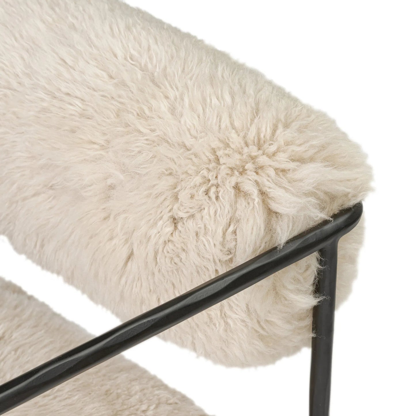 014 SI-2519168 | Closeup | Fenn Chair by Four Hands in champagne mongolian fur, hammered iron. Made from 100% wool fur, iron in a modern style.