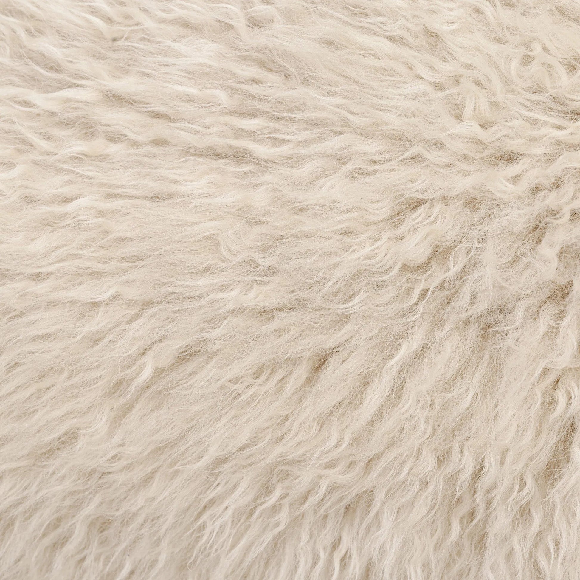 Fenn Chair by Four Hands in champagne mongolian fur, hammered iron. Made from 100% wool fur, iron in a modern style.