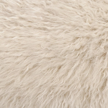 Fenn Chair by Four Hands in champagne mongolian fur, hammered iron. Made from 100% wool fur, iron in a modern style.