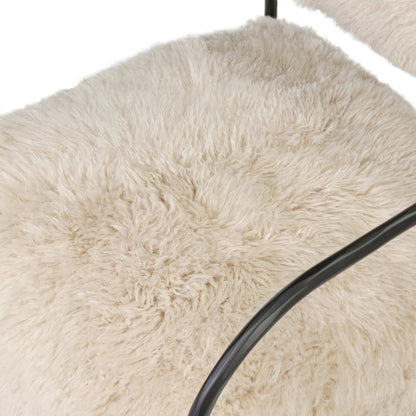 Fenn Chair by Four Hands in champagne mongolian fur, hammered iron. Made from 100% wool fur, iron in a modern style.