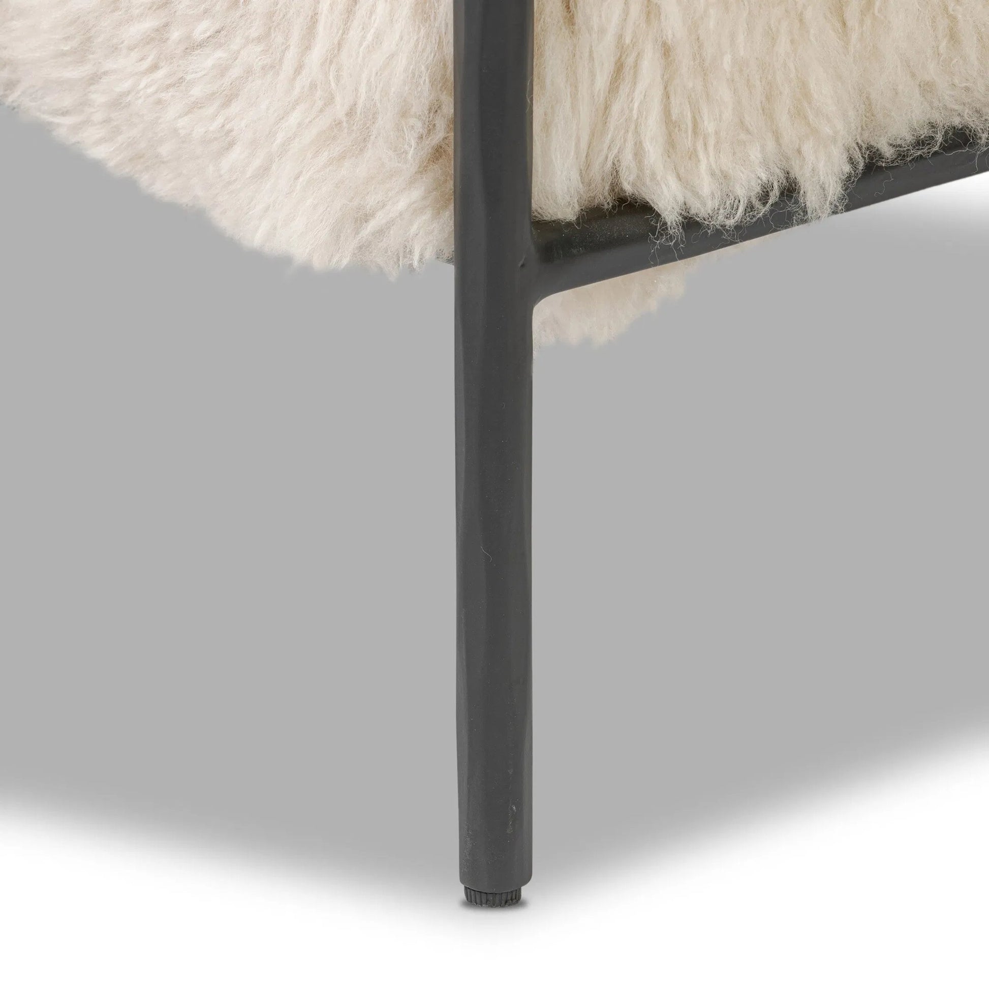 Fenn Chair by Four Hands in champagne mongolian fur, hammered iron. Made from 100% wool fur, iron in a modern style.