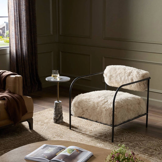 Fenn Chair by Four Hands in champagne mongolian fur, hammered iron. Made from 100% wool fur, iron in a modern style.