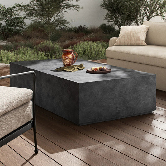 Graso Outdoor Coffee Table by Four Hands in aged grey. Made from aluminum in a unique style.