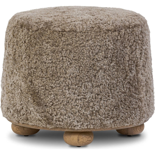 Bilbury Ottoman by Four Hands in taupe shearling, worn oak. Made from shearling, solid oak in a eclectic & global style.