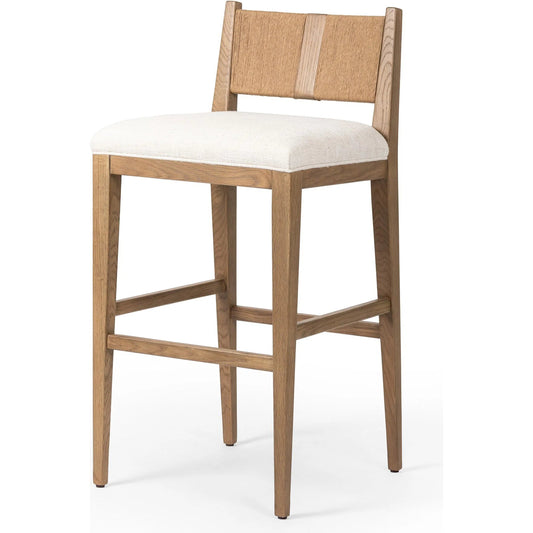 Selene Bar Stool by Four Hands in dover crescent, aged oak, natural paper cord. Made from 71% viscose (rayon), 17% polyester, 12% flax/linen, solid oak, rush in a unique style.