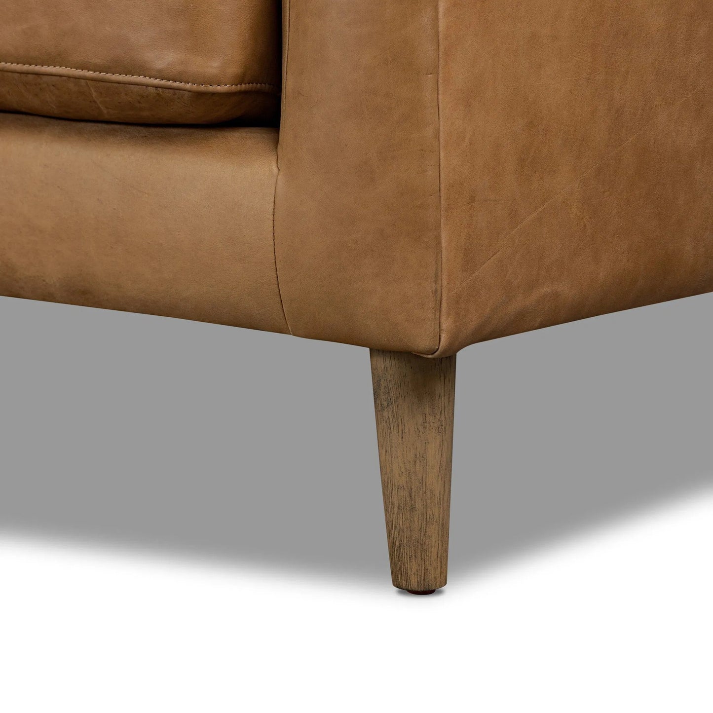 006 SI-2635362 | Closeup | Thurston 2-Piece Sectional by Four Hands in cascara cognac, distressed parawood. Made from top grain leather, solid parawood in a unique style.