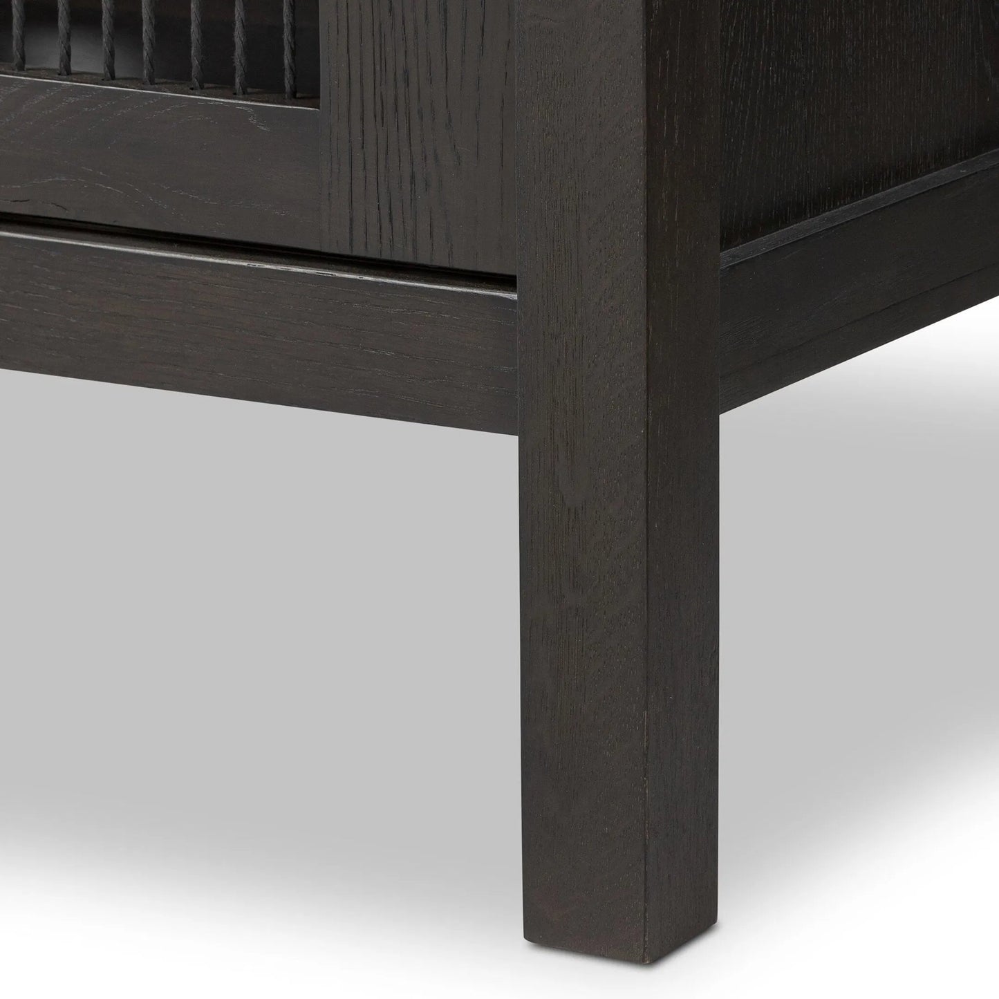 009 SI-2635365 | Closeup | Tuscola Sideboard by Four Hands in smoked black, black paper cord. Made from solid oak, rush in a unique style.