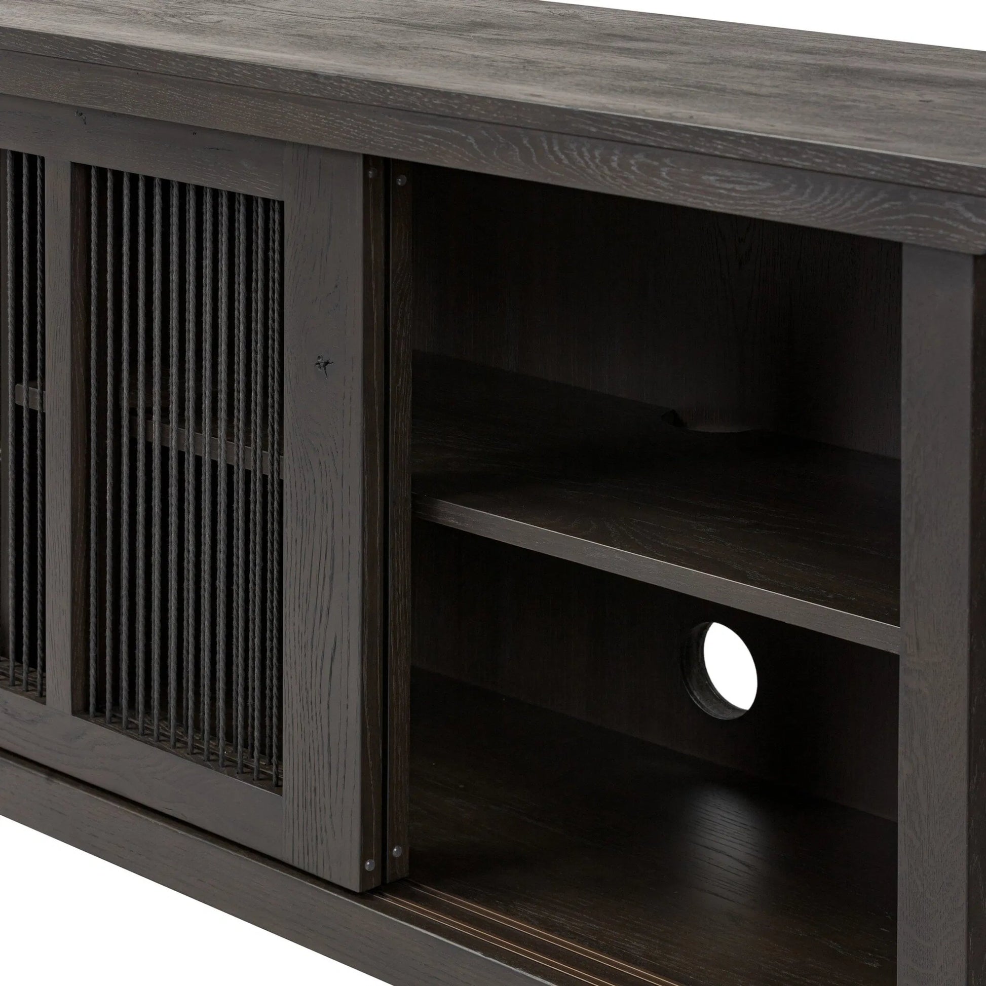 Tuscola Sideboard by Four Hands in smoked black, black paper cord. Made from solid oak, rush in a unique style.