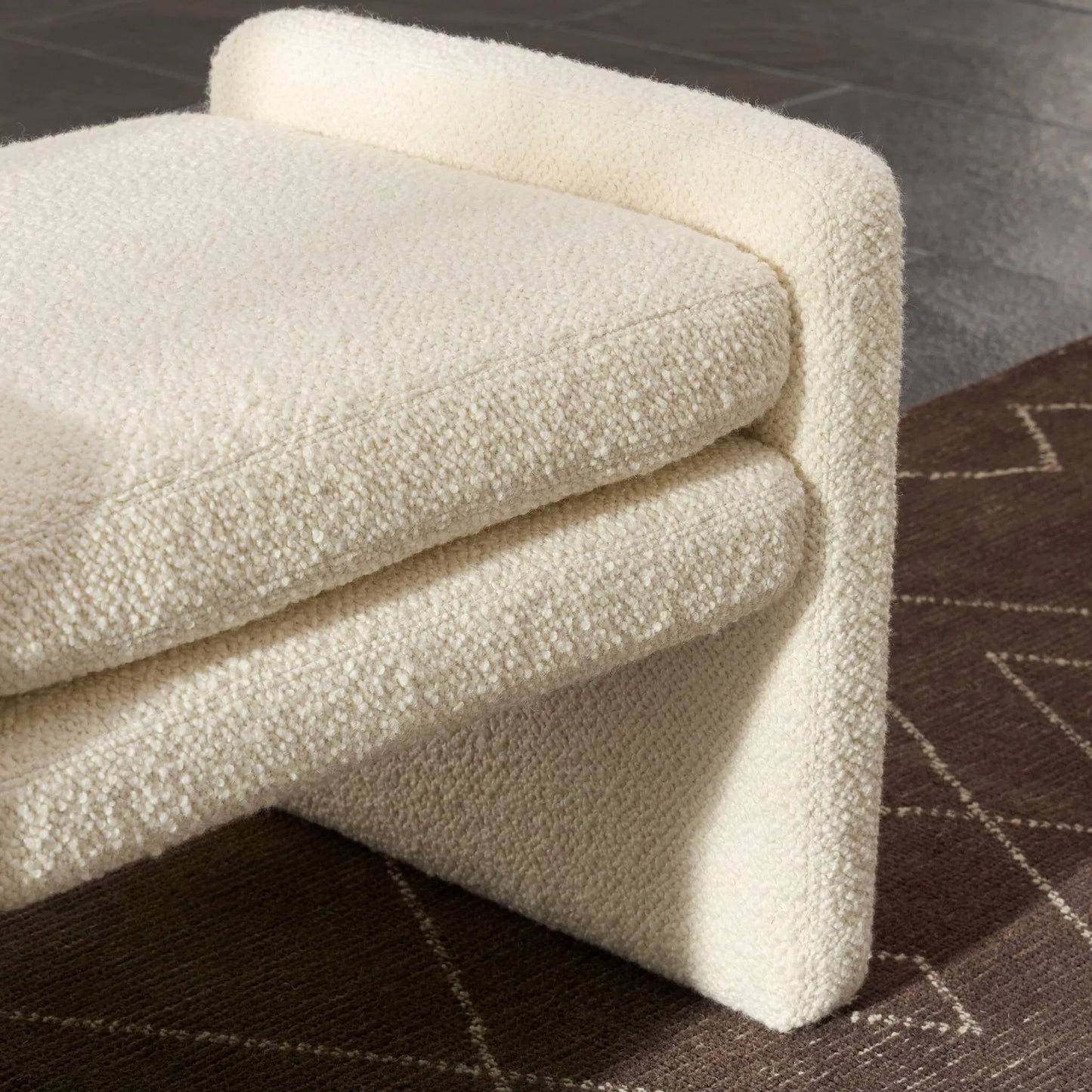 009 SI-2446650 | Closeup | Serena Ottoman by Four Hands in durham cream. Made from 61% polyester, 39% wool in a transitional style.