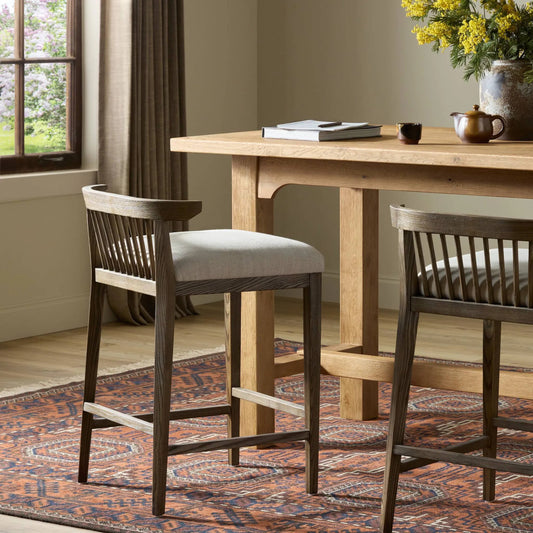 Tullio Counter Stool by Four Hands in savoy parchment, drifted ash. Made from 61% polyester, 31% viscose (rayon), 8% flax/linen, solid ash in a unique style.