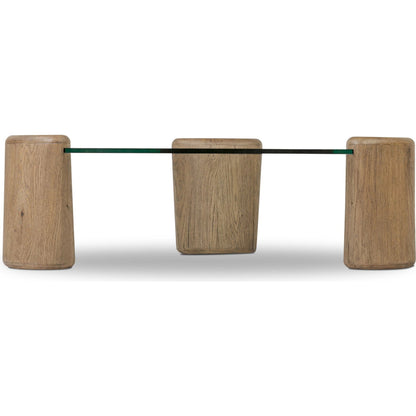 Juno Coffee Table by Four Hands in tempered glass, drifted oak veneer. Made from tempered glass, thick oak veneer in a transitional style.