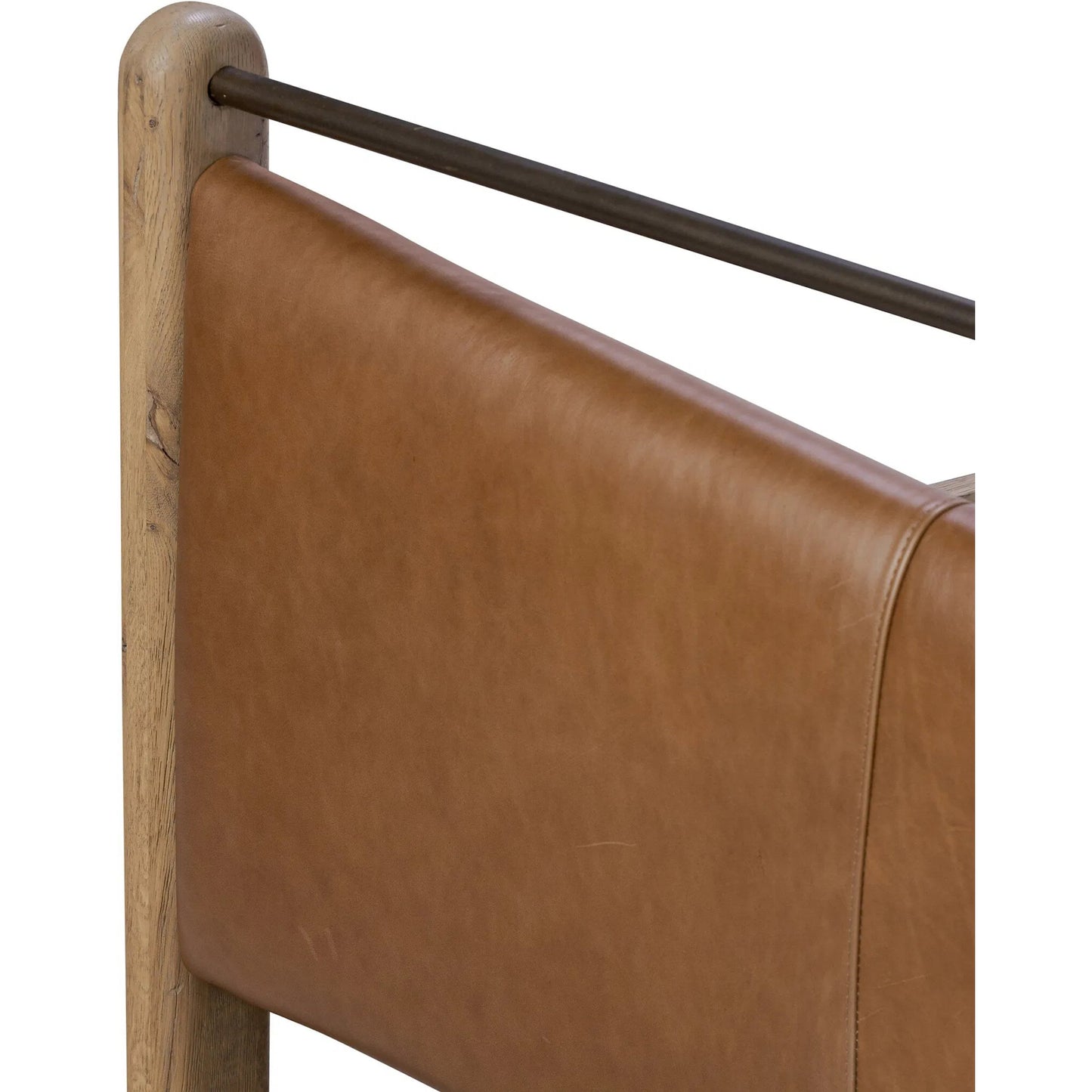 008 SI-2446539 | Closeup | Dina Bed by Four Hands in sonoma chestnut, aged smoked oak, aged smoked oak veneer. Made from top grain leather, solid oak, thick oak veneer in a transitional style.