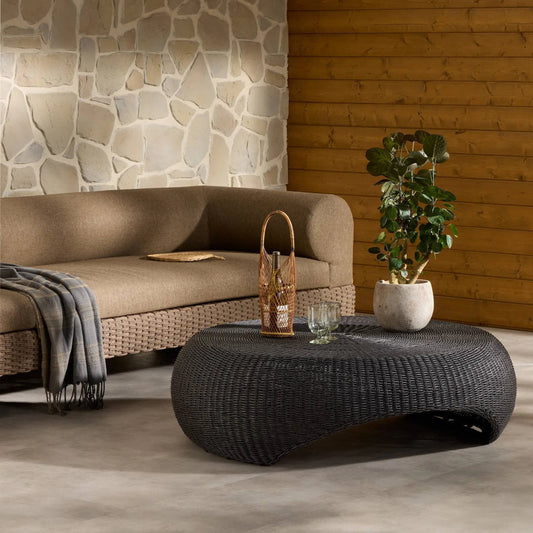 Brock Outdoor Coffee Table by Four Hands. Made from 100% polyethylene in a unique style.