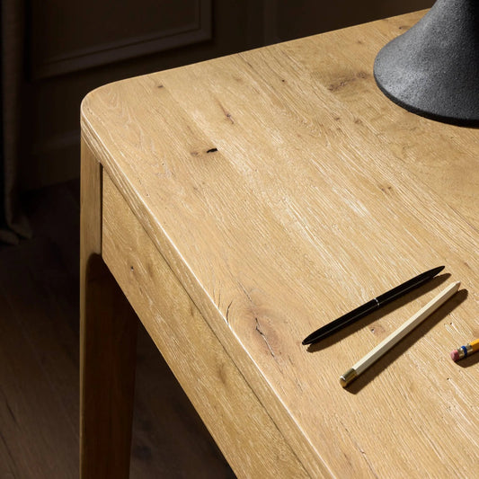 Berke Desk by Four Hands in aged smoked oak veneer. Made from thick oak veneer, solid oak in a transitional style.