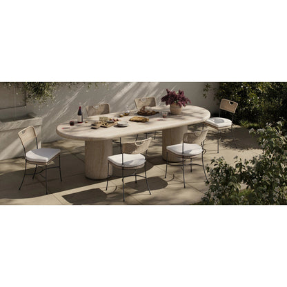 Poole Outdoor Dining Table by Four Hands in textured sand concrete. Made from solid concrete in a transitional style.
