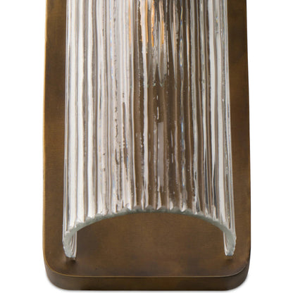 Kenji Sconce by Four Hands in clear reeded glass, burnished brass iron, clear cord. Made from glass, iron, thermoplastic in a traditional style.