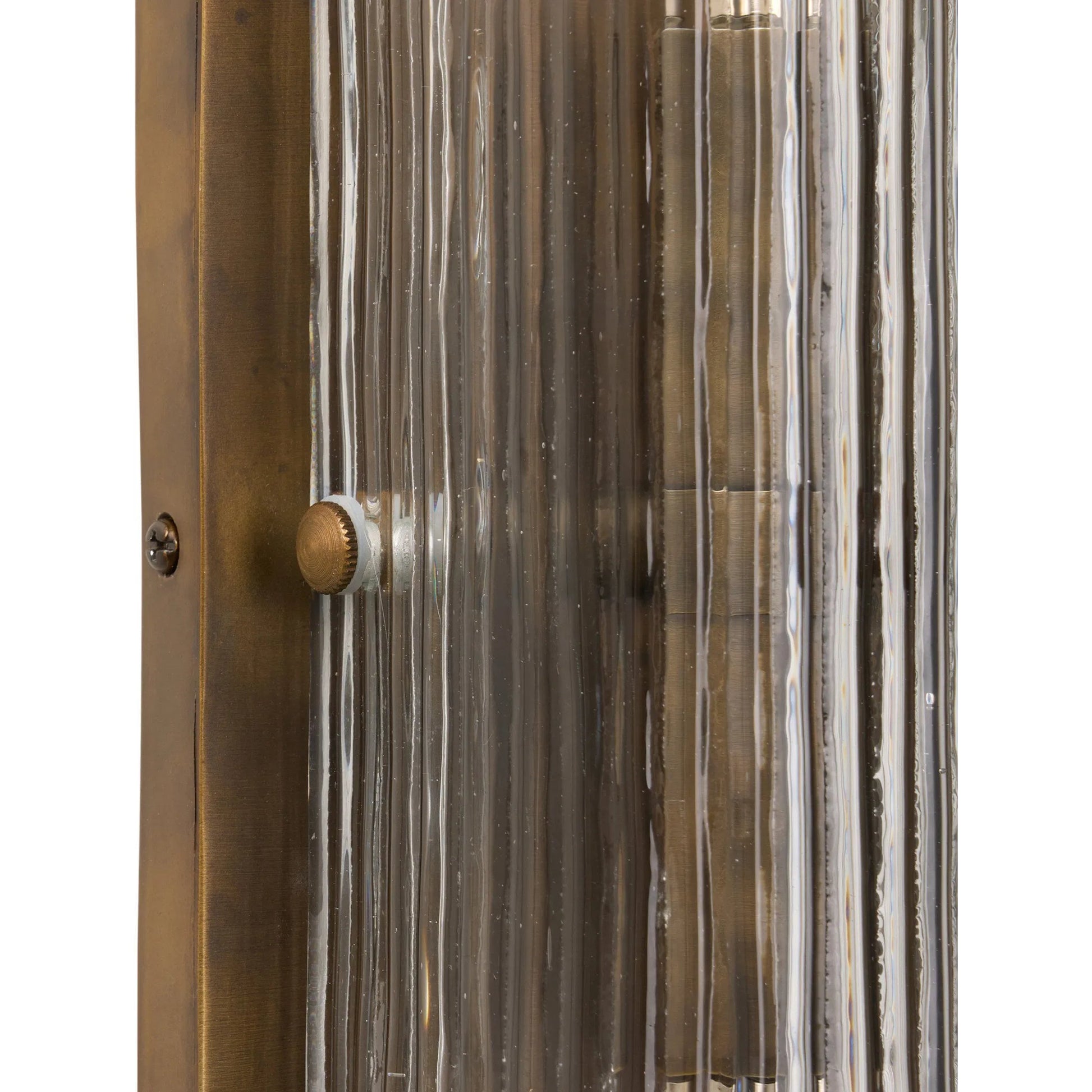Kenji Sconce by Four Hands in clear reeded glass, burnished brass iron, clear cord. Made from glass, iron, thermoplastic in a traditional style.