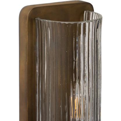 Kenji Sconce by Four Hands in clear reeded glass, burnished brass iron, clear cord. Made from glass, iron, thermoplastic in a traditional style.