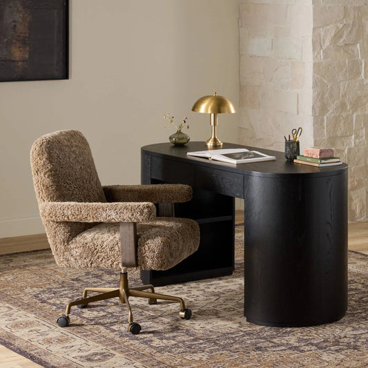 Bergen Desk Chair by Four Hands in taupe shearling, brushed brass aluminum, brown oak. Made from shearling, aluminum, solid oak in a unique style.