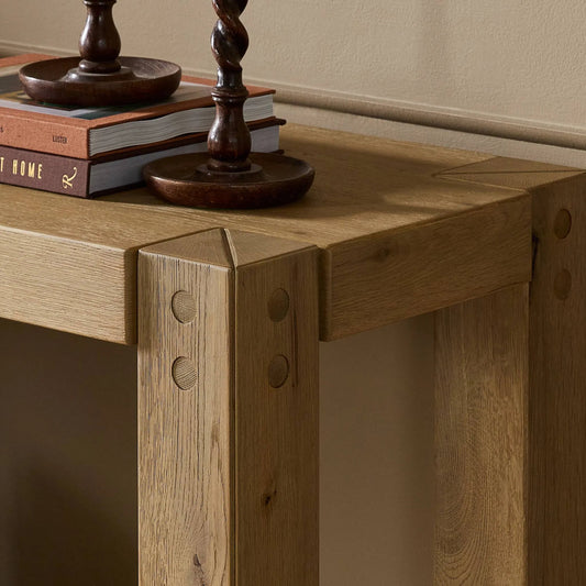 Emmer Console Table by Four Hands in aged smoked oak, aged smoked oak veneer. Made from solid oak, thick oak veneer in a transitional style.
