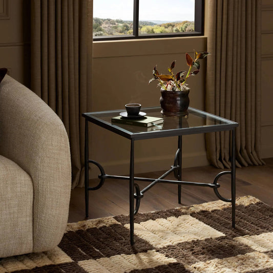 Babylon End Table by Four Hands in tempered glass, hammered gunmetal. Made from tempered glass, iron in a unique style.