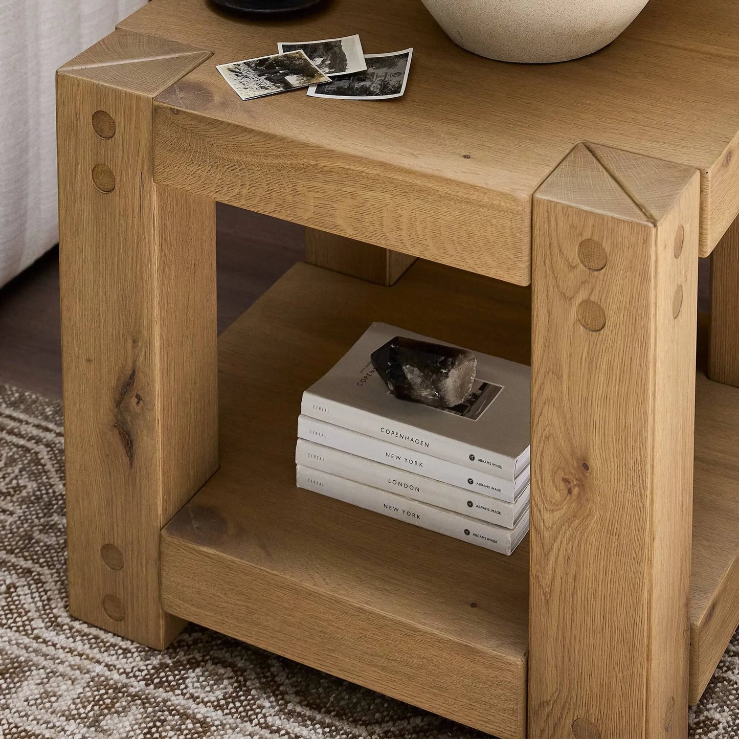 011 SI-2446546 | Lifestyle | Emmer End Table by Four Hands in aged smoked oak, aged smoked oak veneer. Made from solid oak, thick oak veneer in a transitional style.
