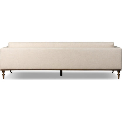 Harlin Sofa by Four Hands in thames cream, brushed brass, amber oak. Made from 66% polyester, 19% acrylic, 15% flax, linen, iron, solid oak in a unique style.