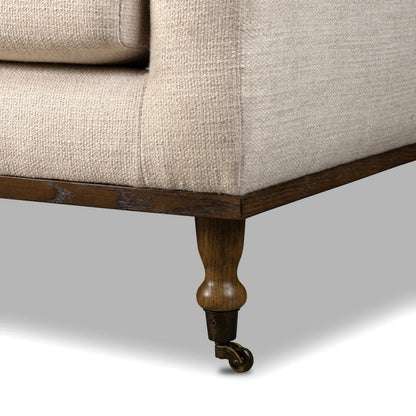 Harlin Sofa by Four Hands in thames cream, brushed brass, amber oak. Made from 66% polyester, 19% acrylic, 15% flax, linen, iron, solid oak in a unique style.