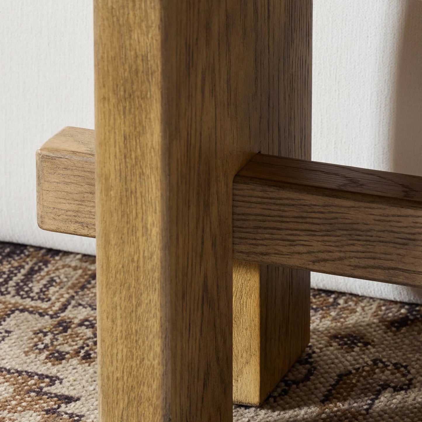 009 SI-2446634 | Closeup | Poe Accent Bench by Four Hands in hampton cream, distressed light oak veneer, black iron. Made from 97% polyester, 2% viscose (rayon), 1% flax/linen, oak veneer, iron in a transitional style.
