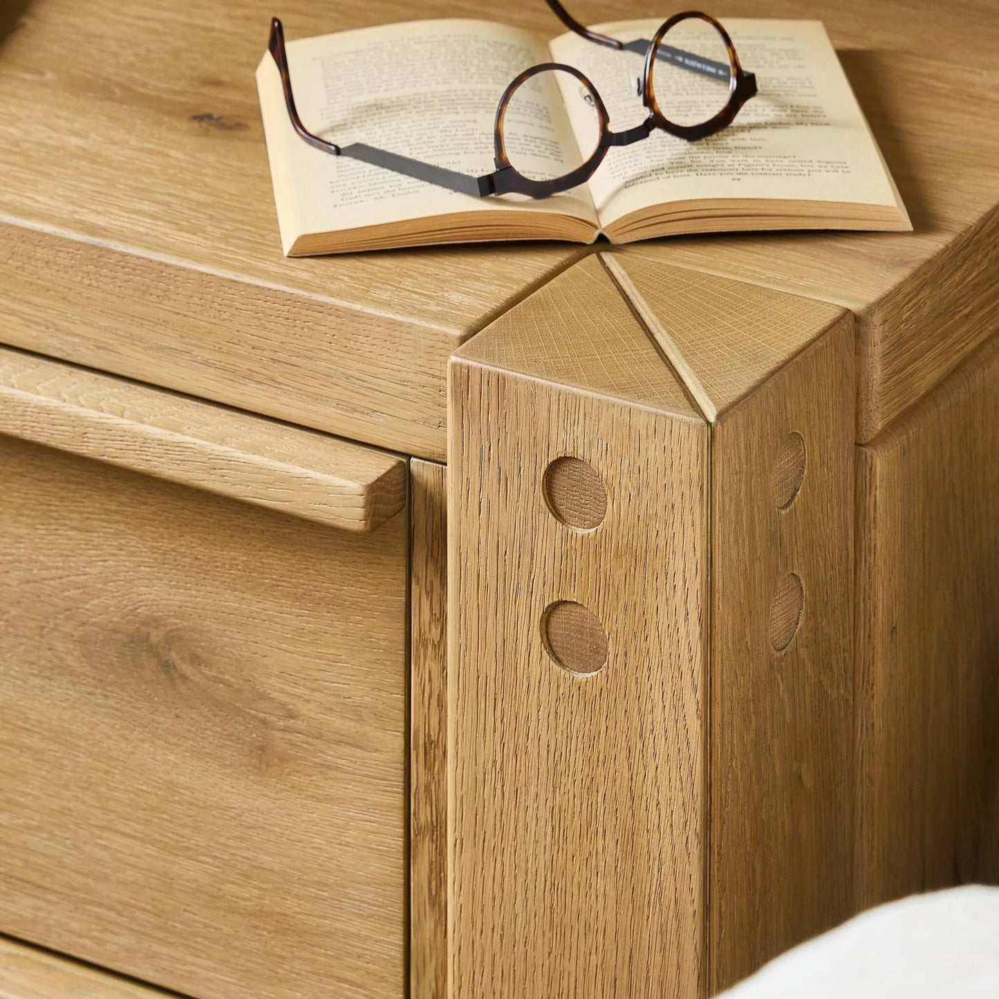 014 SI-2446547 | Closeup | Emmer Nightstand by Four Hands in aged smoked oak, aged smoked oak veneer. Made from solid oak, thick oak veneer in a transitional style.