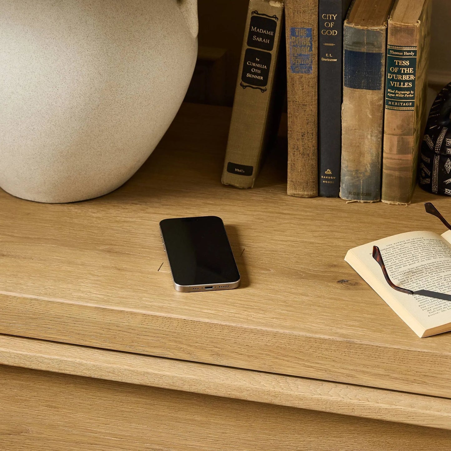 015 SI-2446547 | Lifestyle | Emmer Nightstand by Four Hands in aged smoked oak, aged smoked oak veneer. Made from solid oak, thick oak veneer in a transitional style.