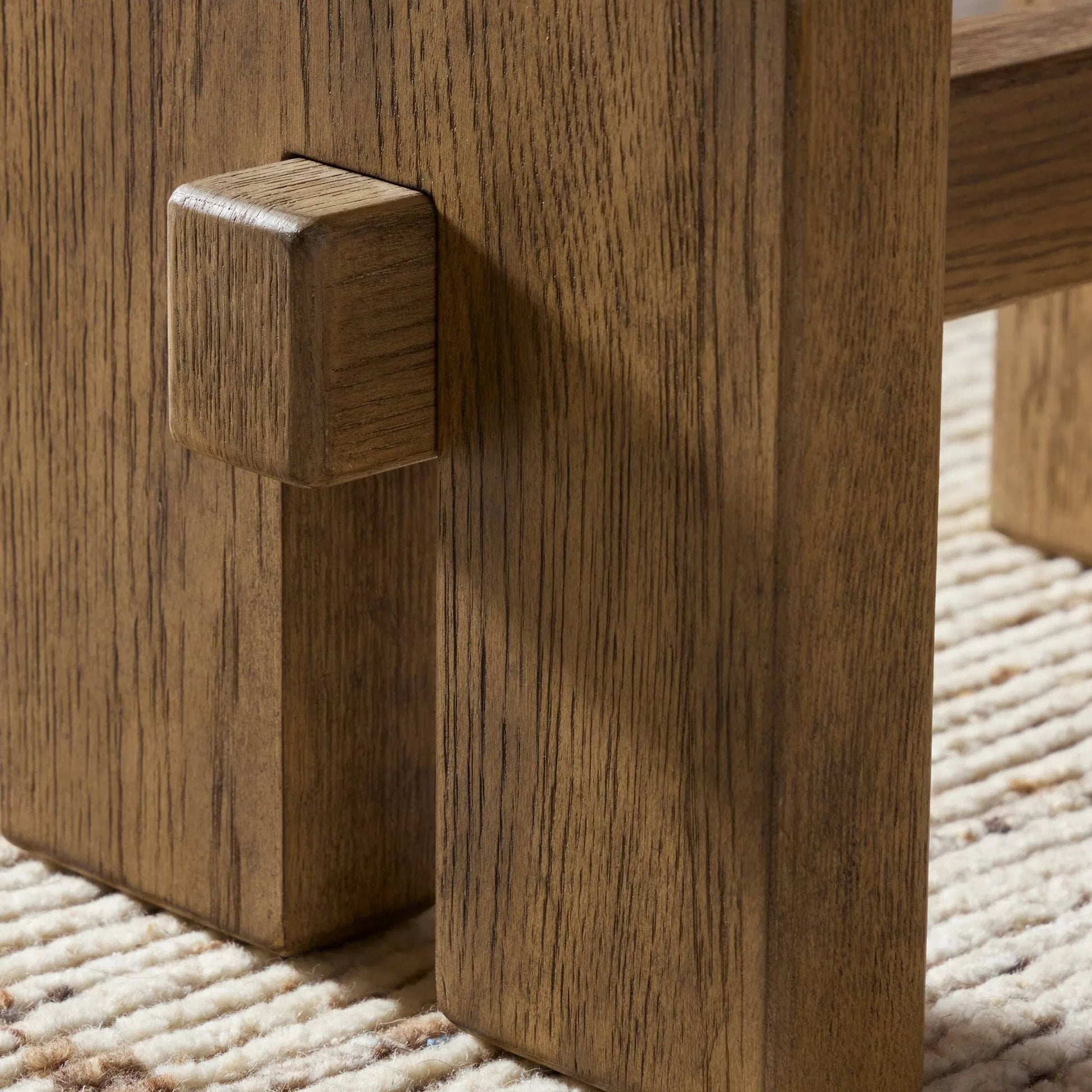 Poe Accent Stool by Four Hands in hampton cream, distressed light oak veneer, black iron. Made from 97% polyester, 2% viscose (rayon), 1% flax/linen, oak veneer, iron in a transitional style.