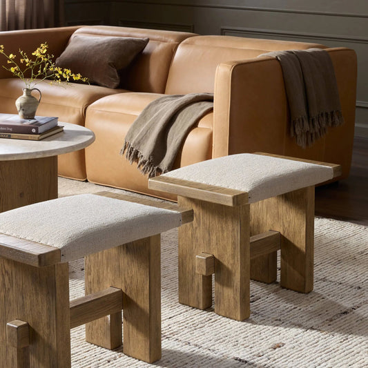 Poe Accent Stool by Four Hands in hampton cream, distressed light oak veneer, black iron. Made from 97% polyester, 2% viscose (rayon), 1% flax/linen, oak veneer, iron in a unique style.