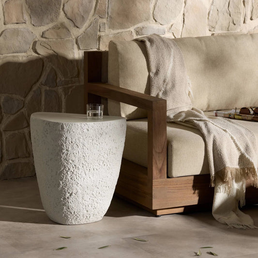 Medina Outdoor End Table by Four Hands in matte stone, blanc stone. Made from solid concrete in a transitional style.
