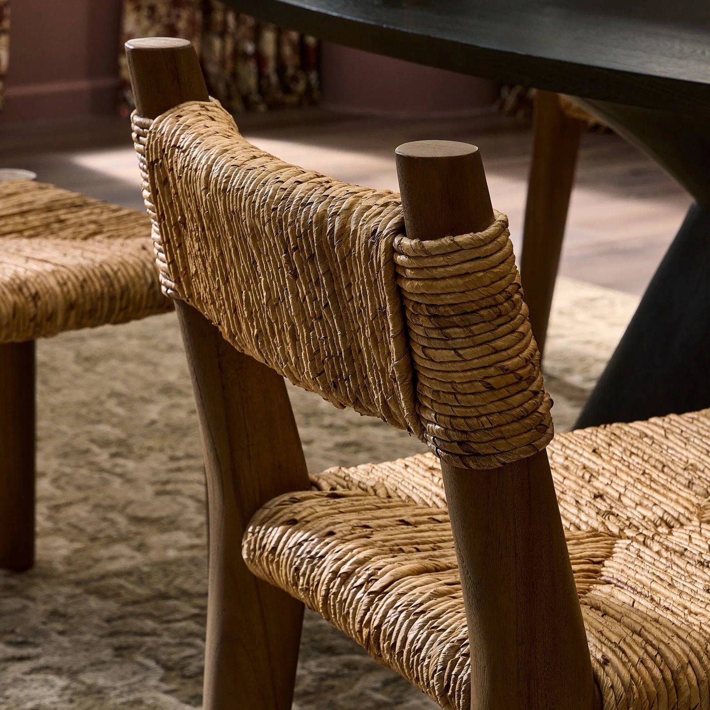 013 SI-2473213 | Closeup | Bovard Dining Chair by Four Hands in stained toasted brown, slight dark bleaching. Made from solid teak, banana leaf in a rustic style.