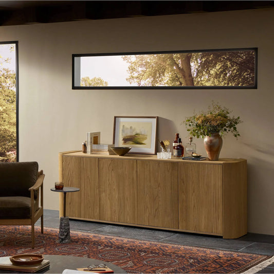 Radius Sideboard by Four Hands in light blonde sungkai veneer. Made from thick sungkai veneer in a unique style.