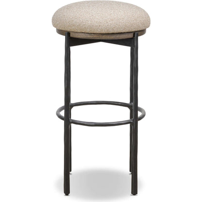 Cofer Swivel Bar Stool by Four Hands in weslie flax, dark hammered iron, brown oak. Made from 100% recycled olefin, iron, solid oak in a cottage & farmhouse style.