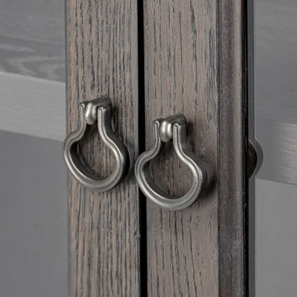 Alden Cabinet by Four Hands in worn black oak veneer, mottled gunmetal. Made from thick oak veneer, solid oak, iron in a traditional style.