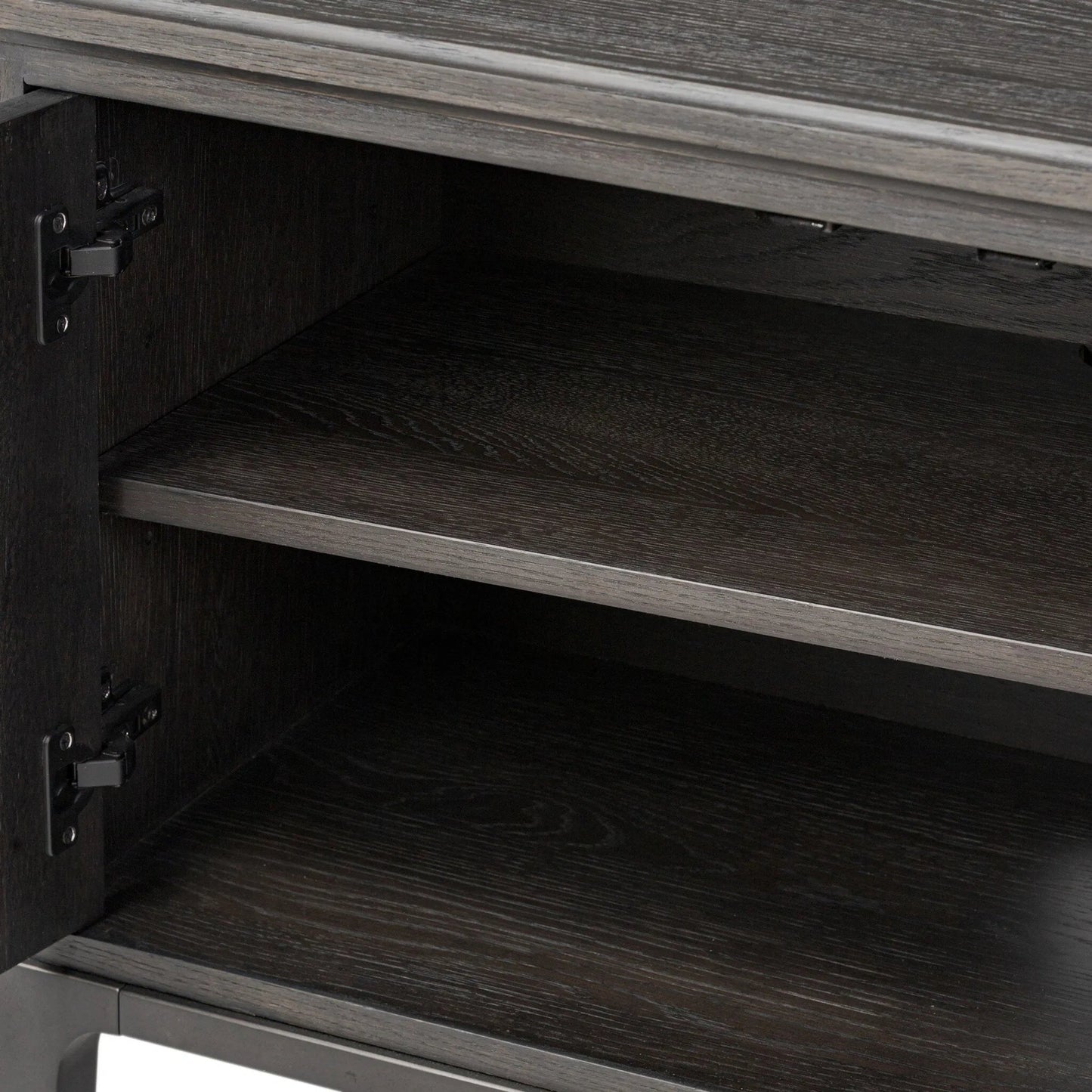 012 SI-2446495 | Closeup | Alden Media Console by Four Hands in worn black oak veneer, mottled gunmetal. Made from thick oak veneer, solid oak, iron in a traditional style.