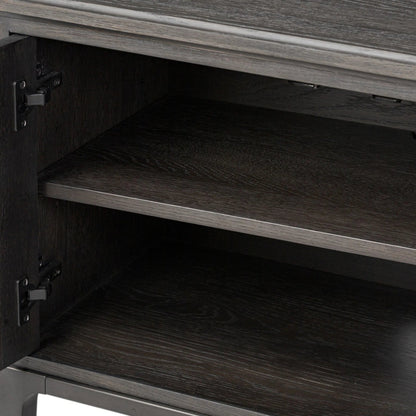 Alden Media Console by Four Hands in worn black oak veneer, mottled gunmetal. Made from thick oak veneer, solid oak, iron in a traditional style.