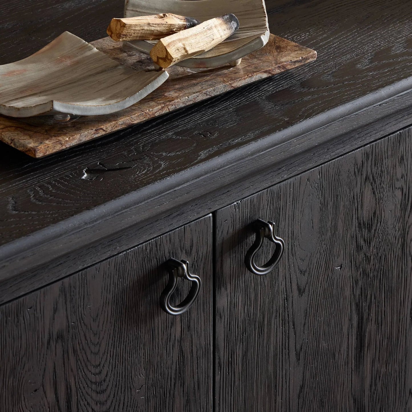 013 SI-2446495 | Closeup | Alden Media Console by Four Hands in worn black oak veneer, mottled gunmetal. Made from thick oak veneer, solid oak, iron in a traditional style.