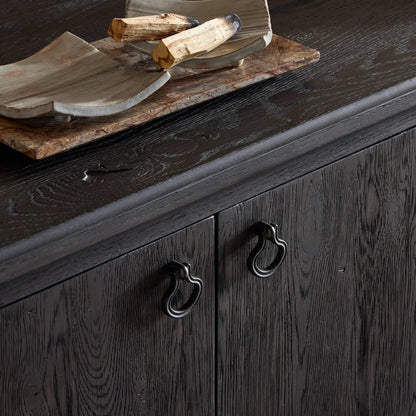 Alden Media Console by Four Hands in worn black oak veneer, mottled gunmetal. Made from thick oak veneer, solid oak, iron in a traditional style.