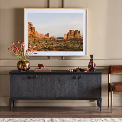 Alden Media Console by Four Hands in worn black oak veneer, mottled gunmetal. Made from thick oak veneer, solid oak, iron in a traditional style.