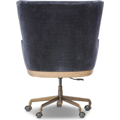 Bernardo Desk Chair by Four Hands in monte navy, brushed brass, weathered oak. Made from 50% viscose, 50% wool, iron, solid oak in a modern style.