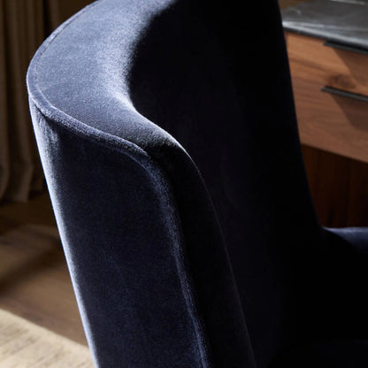 Bernardo Desk Chair by Four Hands in monte navy, brushed brass, weathered oak. Made from 50% viscose, 50% wool, iron, solid oak in a modern style.